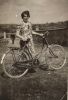 Photo of A Lady with a Bicycle