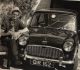 Photo of Man Sitting With A Mini Minor Car